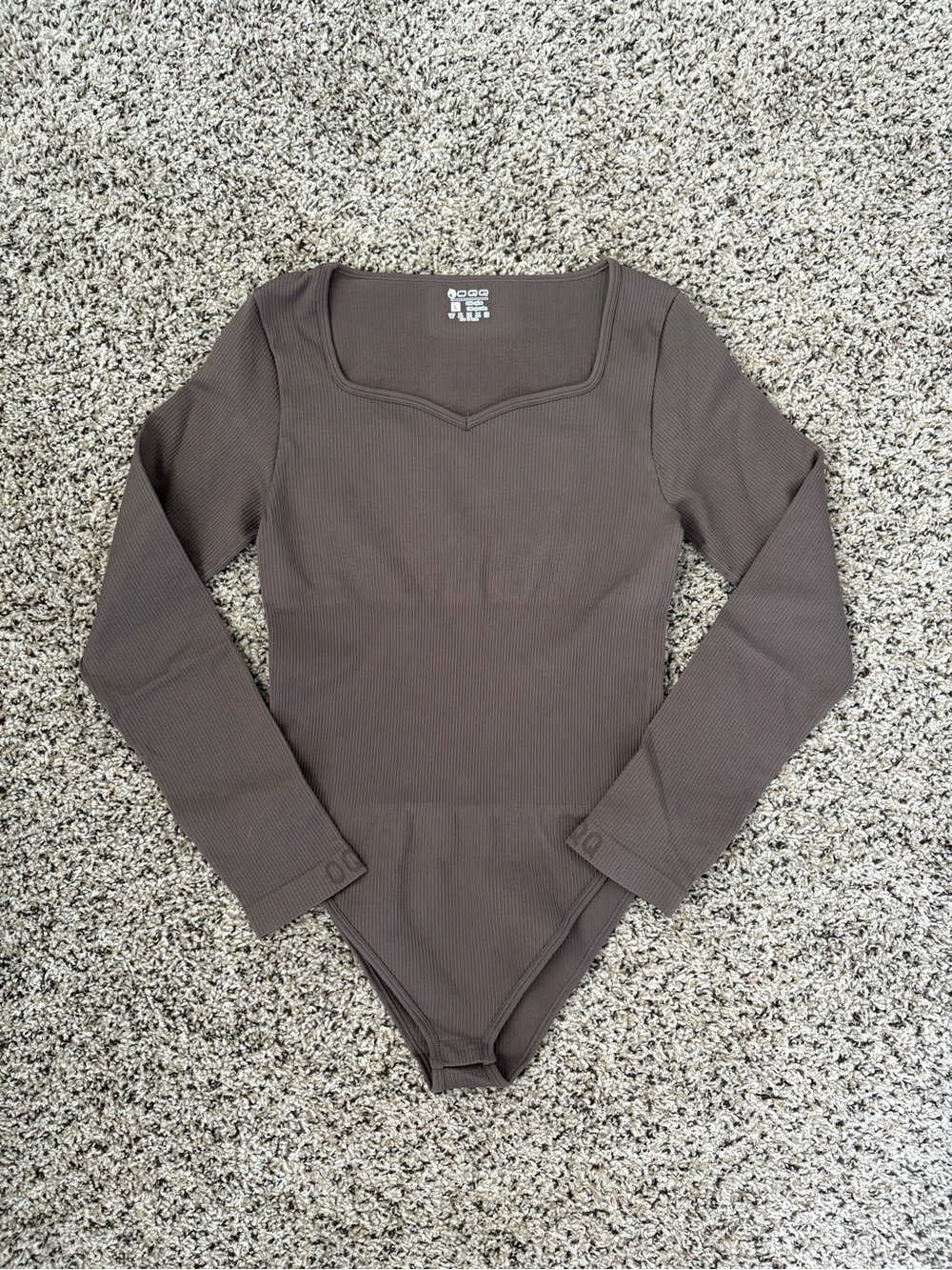 OQQ Long Sleeve Ribbed One-Piece Bodysuit in Brown